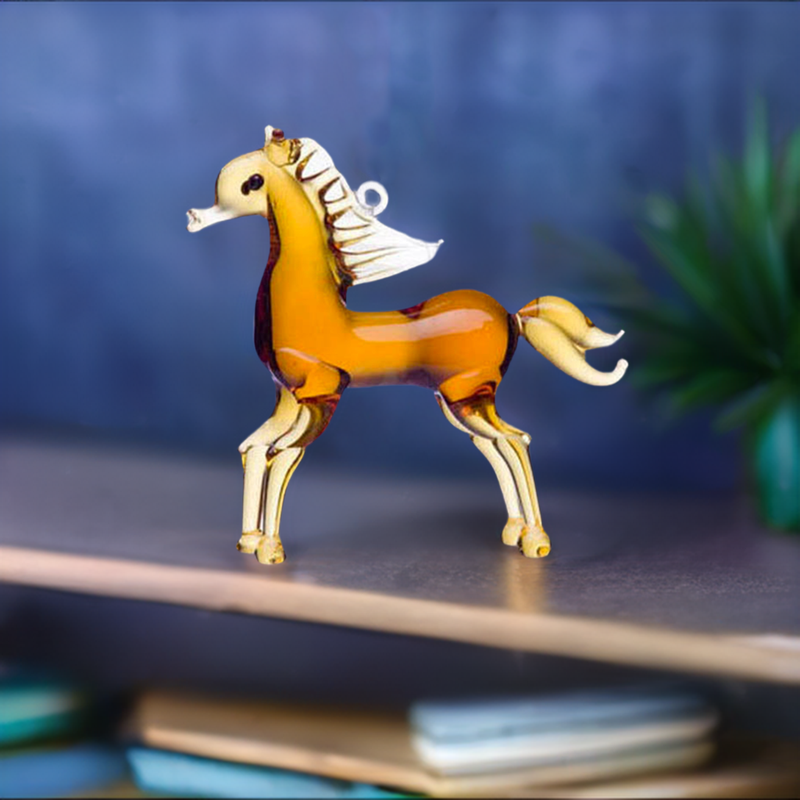 glass horse ornament displayed standing on book shelf