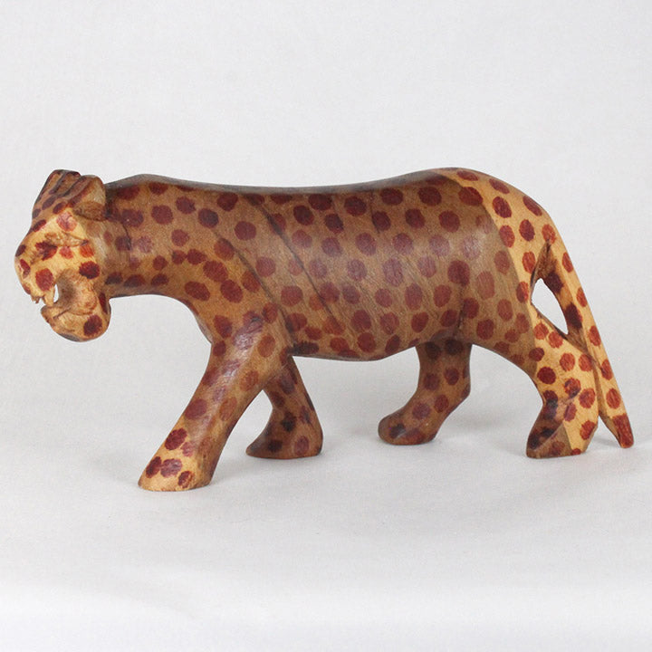 carved wood roaring leopard figurine - left side detail
