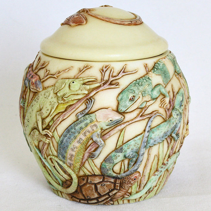 harmony ball the masquerade jardinia decorative lidded jar, image showing monitor lizard and box turtle