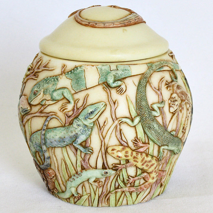 harmony ball the masquerade jardinia decorative lidded jar, image showing iguana, spotted gecko and green lizards