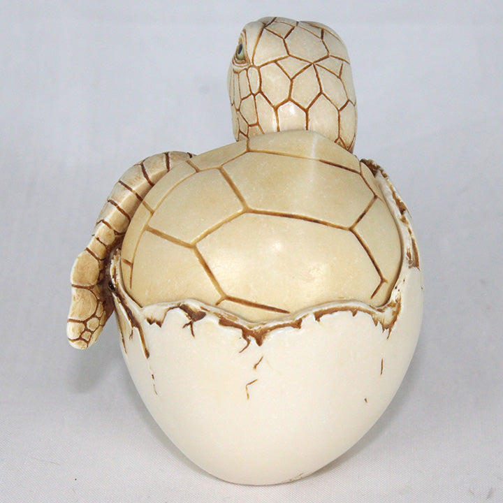 back view of Adam Binder new dawn sea turtle hatchling box figurine