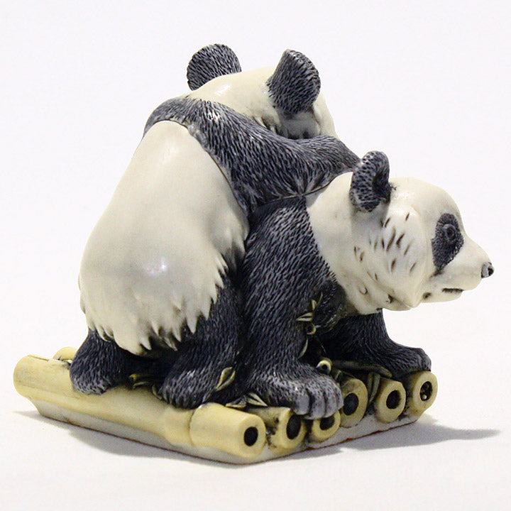 Harmony Kingdom Survivor Panda pair box figurine, left side view