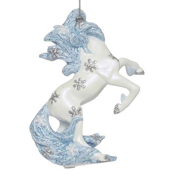 trail of painted ponies winter wonderland ornament, white stallion with glittered blue mane and tail and silver snowflakes on body, back view
