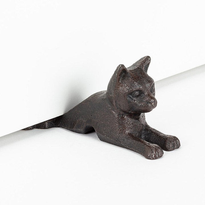 cast iron cat door wedge in position under door