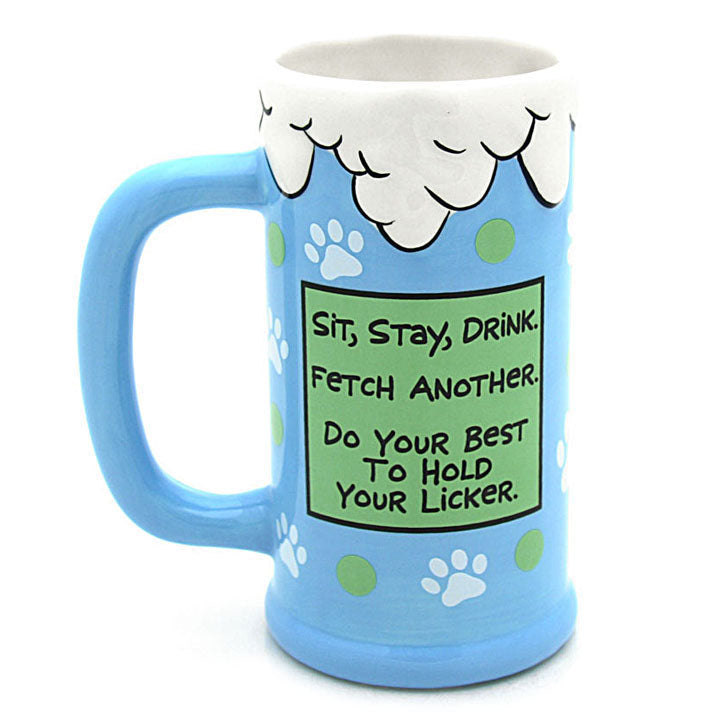 our name is mud blue mug with white "foam" at top and white paw print and green dot art image showing back text that reads "sit, stay, drink. fetch another. do your best to hold licker."