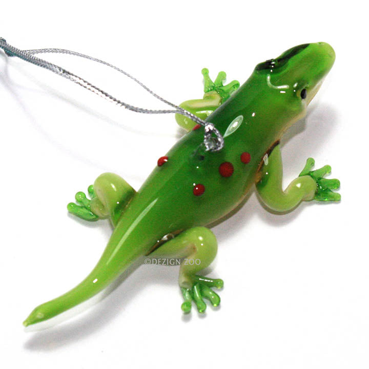 glass green gecko with red spots on back ornament with silver hanging cord