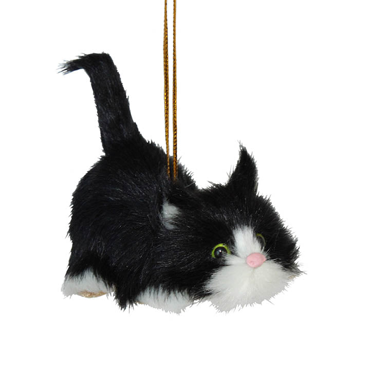 black and white tuxedo furry kitten with green eyes ornament facing forward right